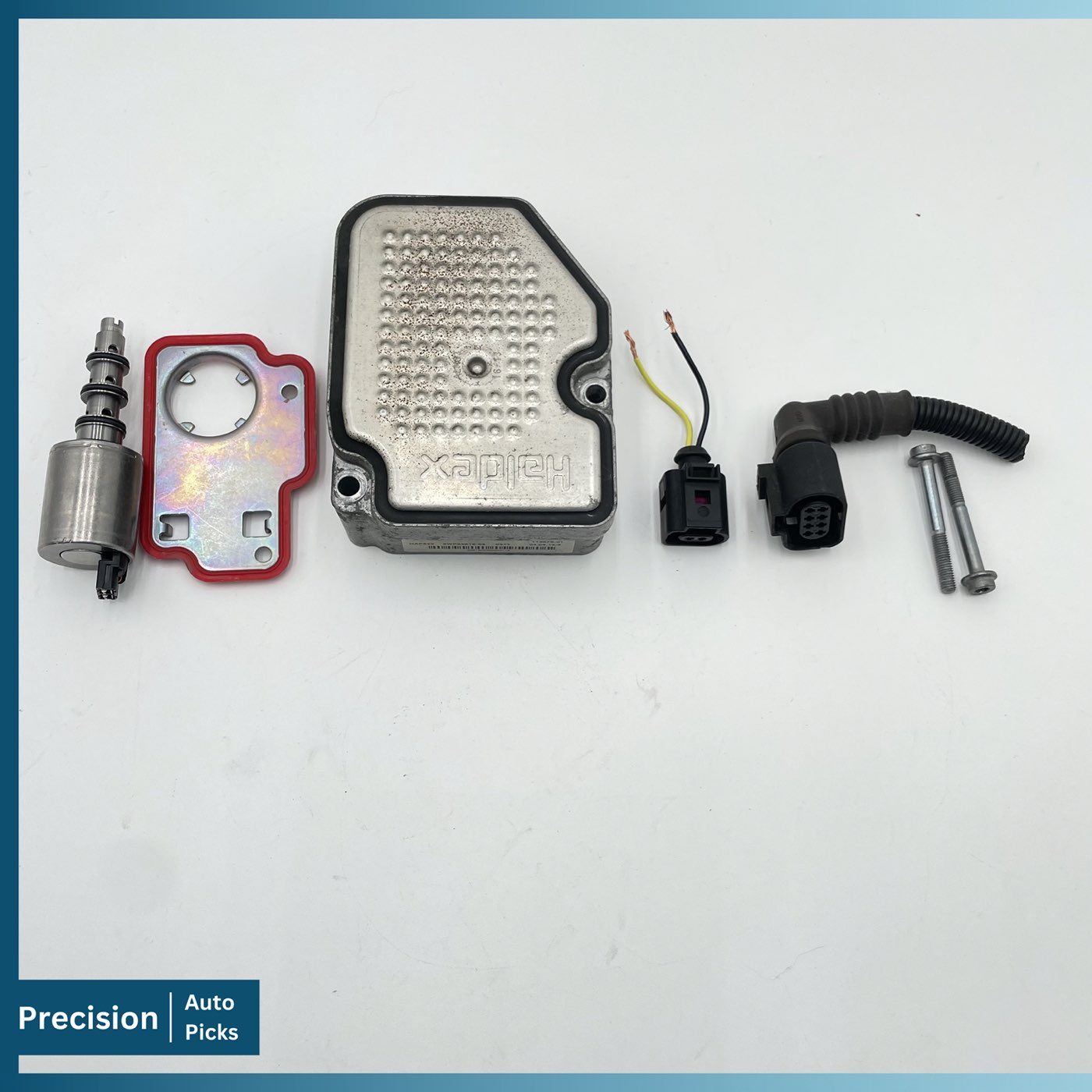 Volvo Haldex Gen 4 DEM with AOC pump solenoid, steel filter, connector pigtails and mounting bolts laid out